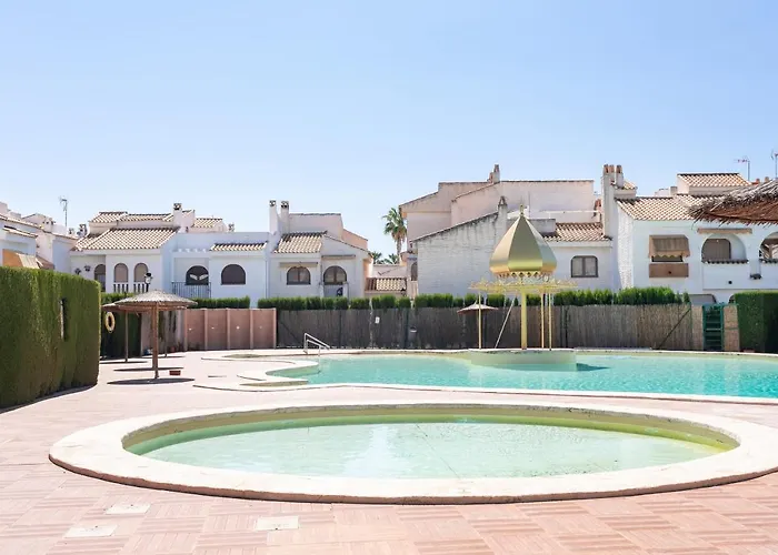 Сasa de vacaciones Casa En La Playa Con Piscinas E