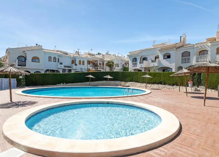 Сasa de vacaciones Casa En La Playa Con Piscinas E